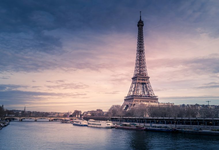Eiffel Tower in Paris at sunset over the River Seine